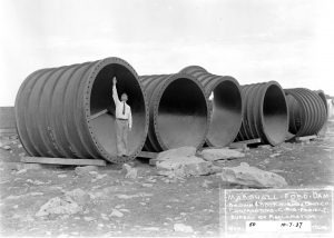 Black and white photo of the Mansfield Dam architect standing on the construction site in 1937, overseeing the progress. Photo courtesy of LCRA.
