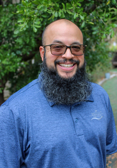 WCID No. 17 Maintenance Manager wearing a blue work polo with the district logo.