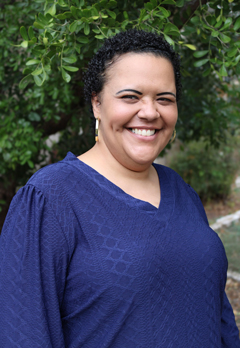 WCID No. 17 Customer Service Manager smiling, dressed in professional business attire.